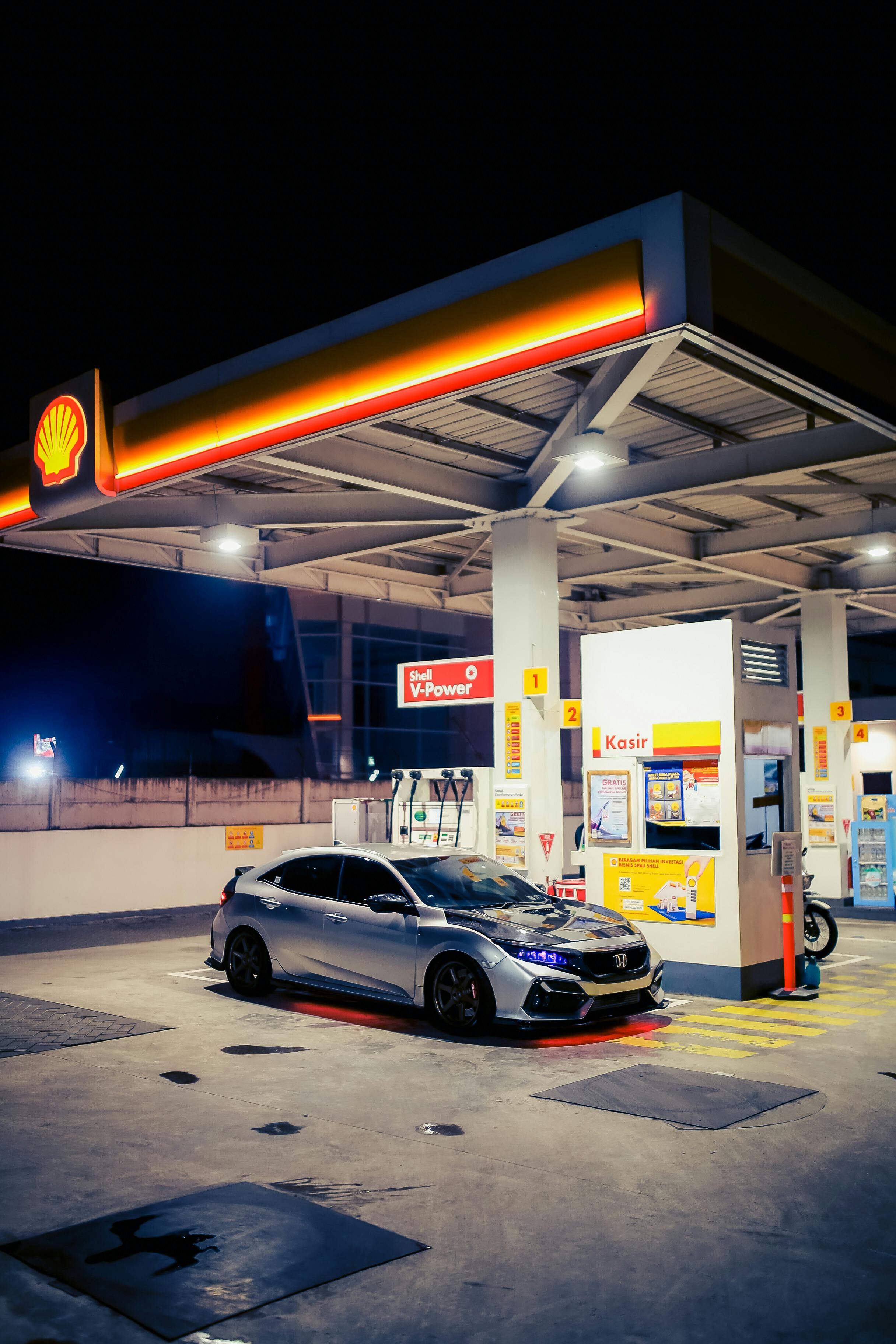 Modern fuel station with car refueling